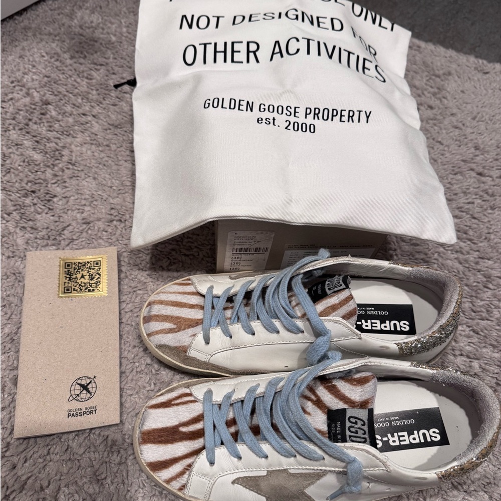 Golden Goose Zebra Pattern Sneakers with Silver and Blue Accents